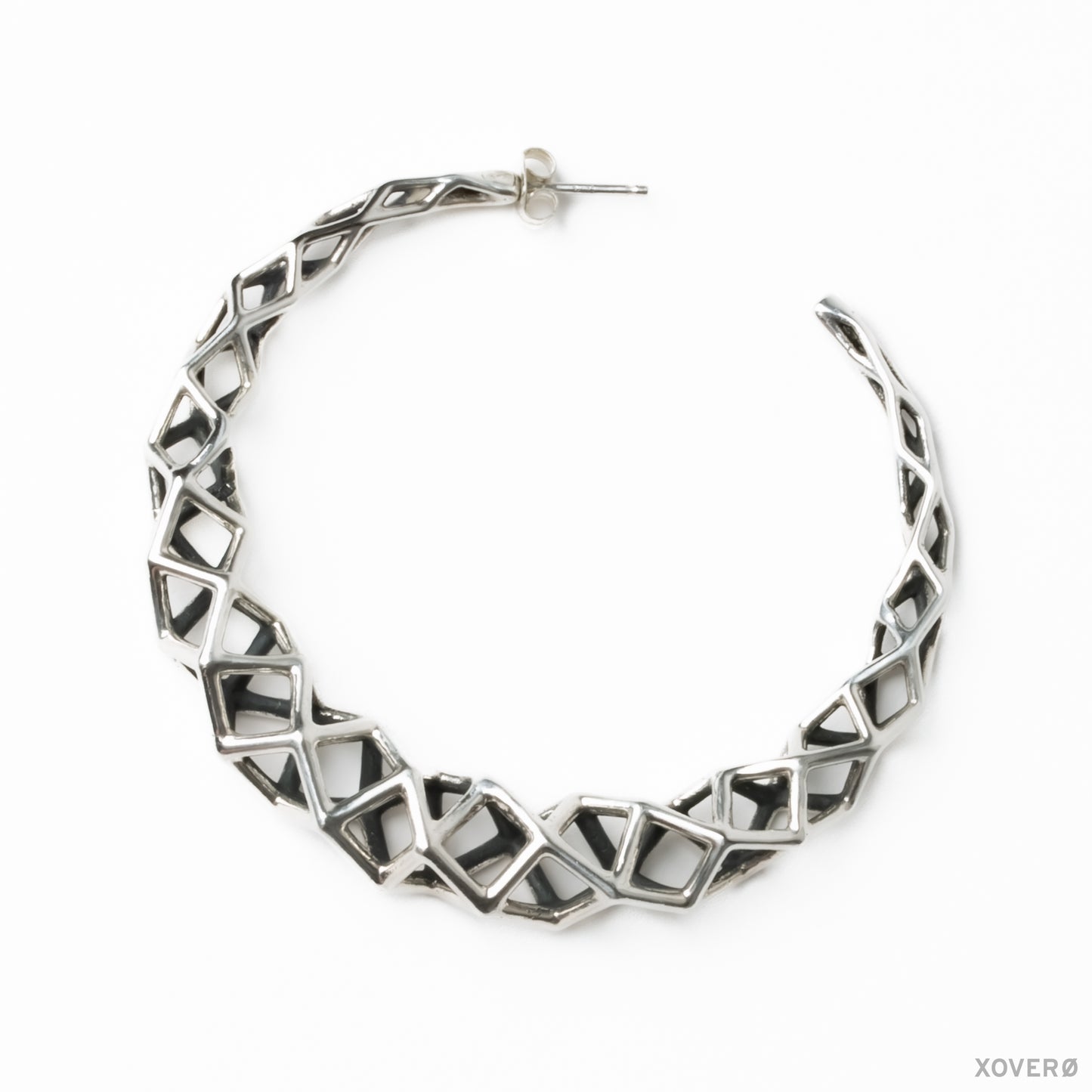 One large sterling silver architectural hoop earring shown in detail for clarity but they are sold as a pair.