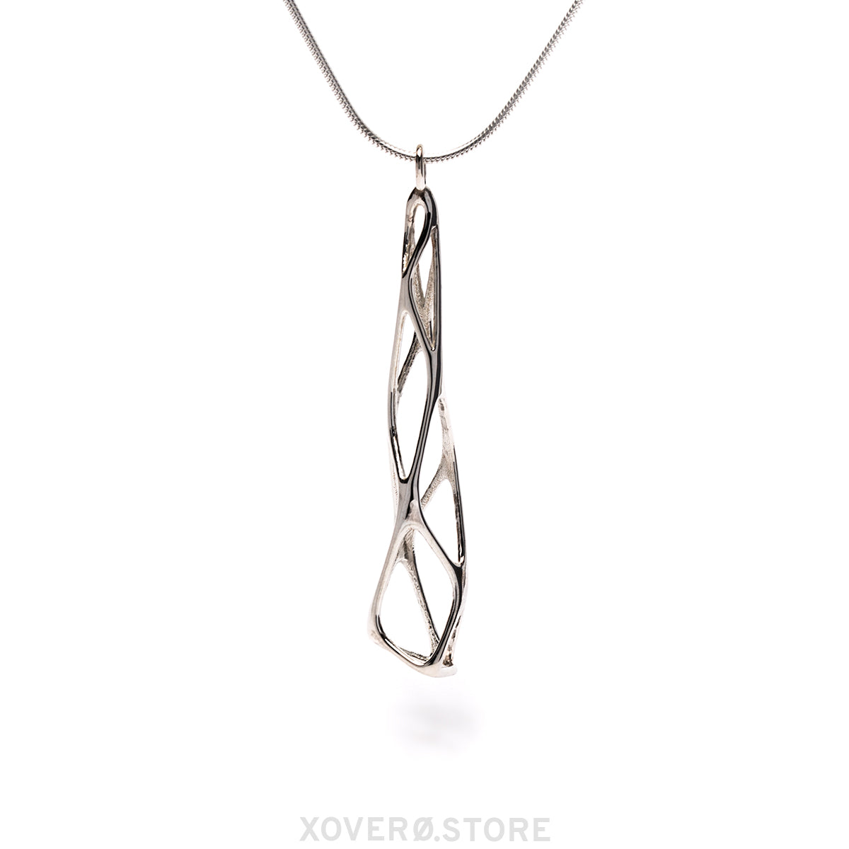 This image shows our solid sterling silver "Tamarix" necklace without contrast oxidation. This finish is available upon request if you would like us to forgo the extra step of darkening the inner areas.