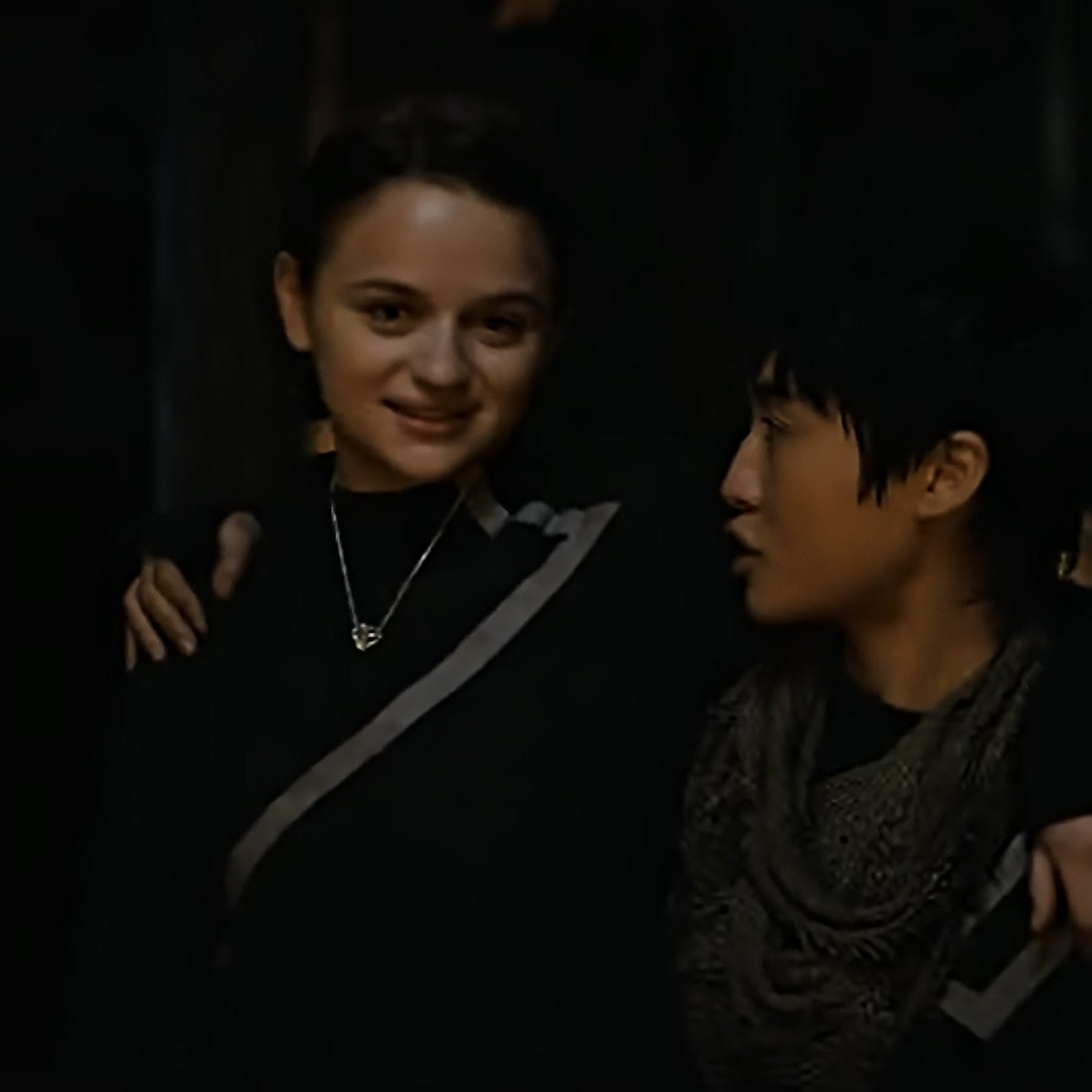 Joey King portrays Tally Youngblood in Netflix's Uglies, wearing the Geoheart Pendant Necklace. In this image she affectionately walks shoulder-to-shoulder with her best friend. The solid sterling silver heart pendant gleams brightly, even in the night scene.