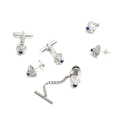 This pair of sapphire and solid sterling silver cuff links is part of a collection that includes a matching tie tack, and earrings, all shown here on a white background. 